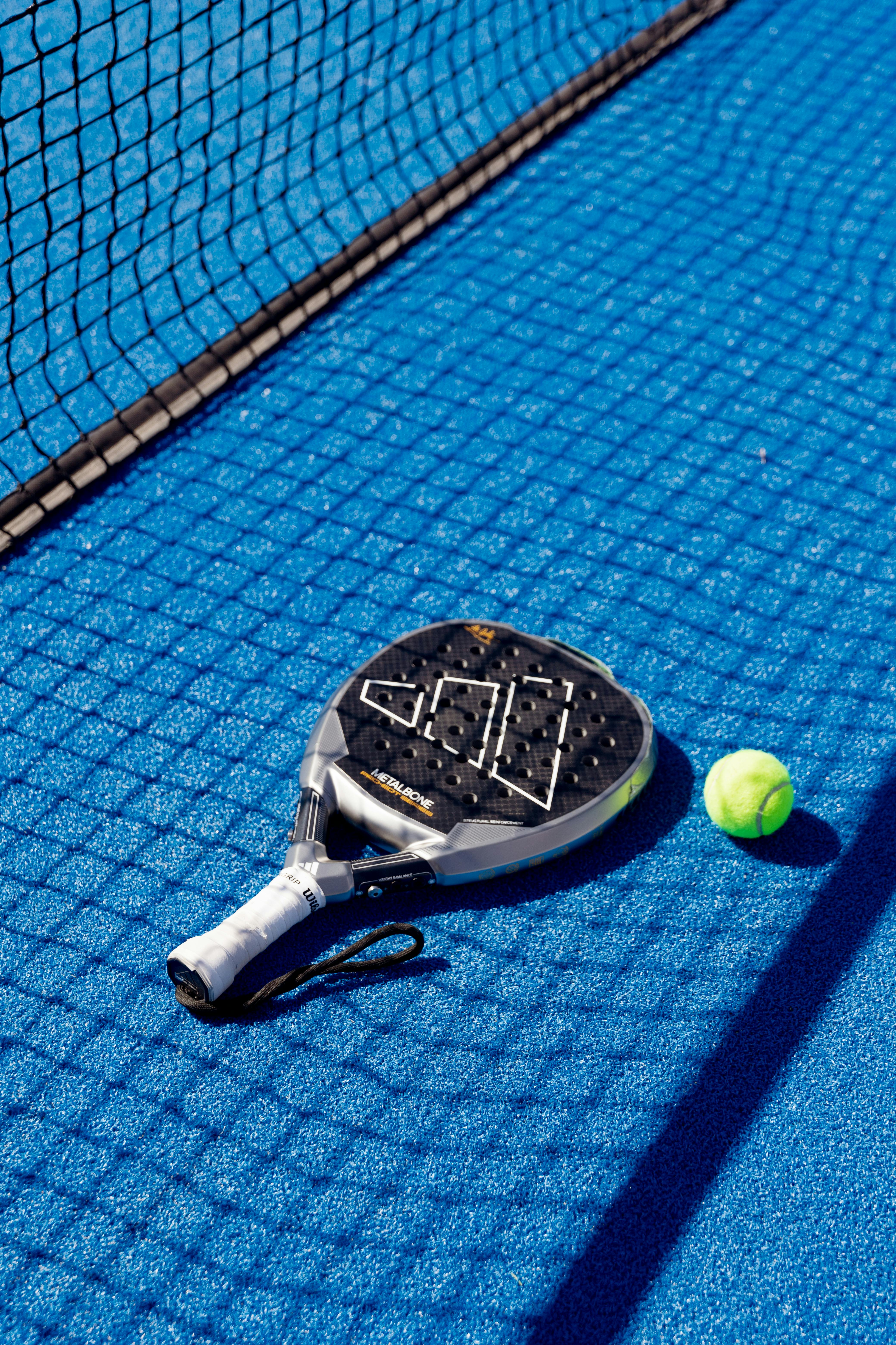 Padel racket and ball